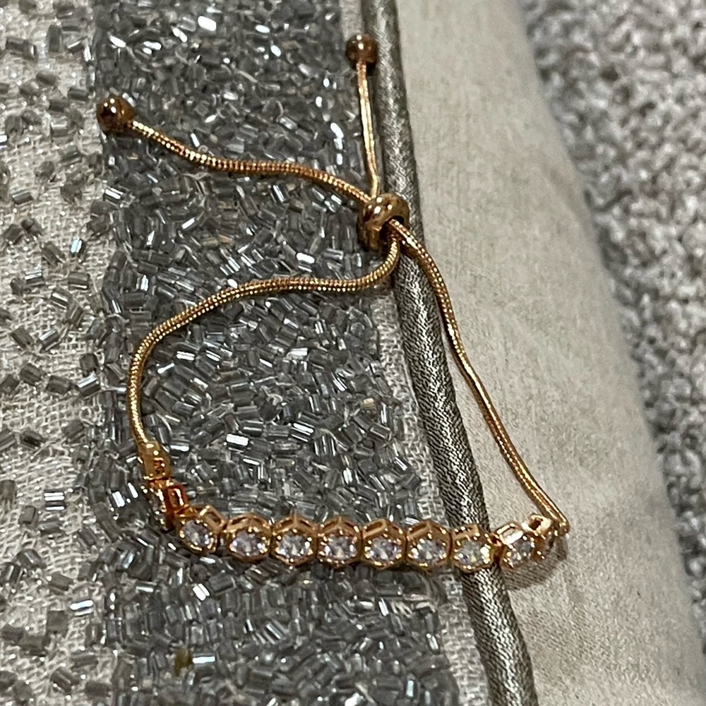 Elegant Gold Bracelet with Clear Accents - Picture 7 of 9